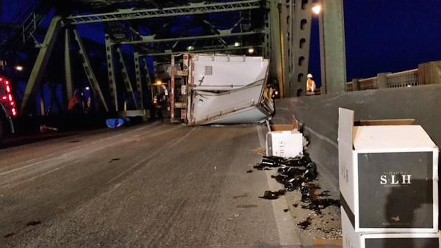 A semi crashed and overturned on the southbound Interstate 5 bridge, closing the highway for about five hours.