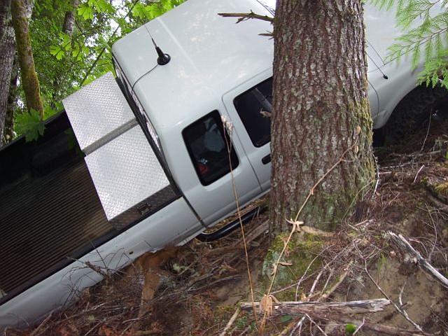 Two Oregon men were cited after they wrecked this truck while allegedly trying to load a poached deer.