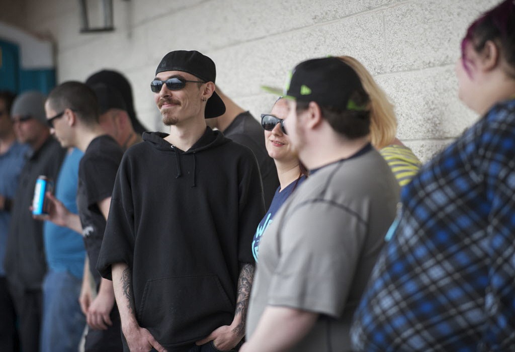 A crowd lines up for the grand opening of New Vansterdam marijuana shop on July 11.
