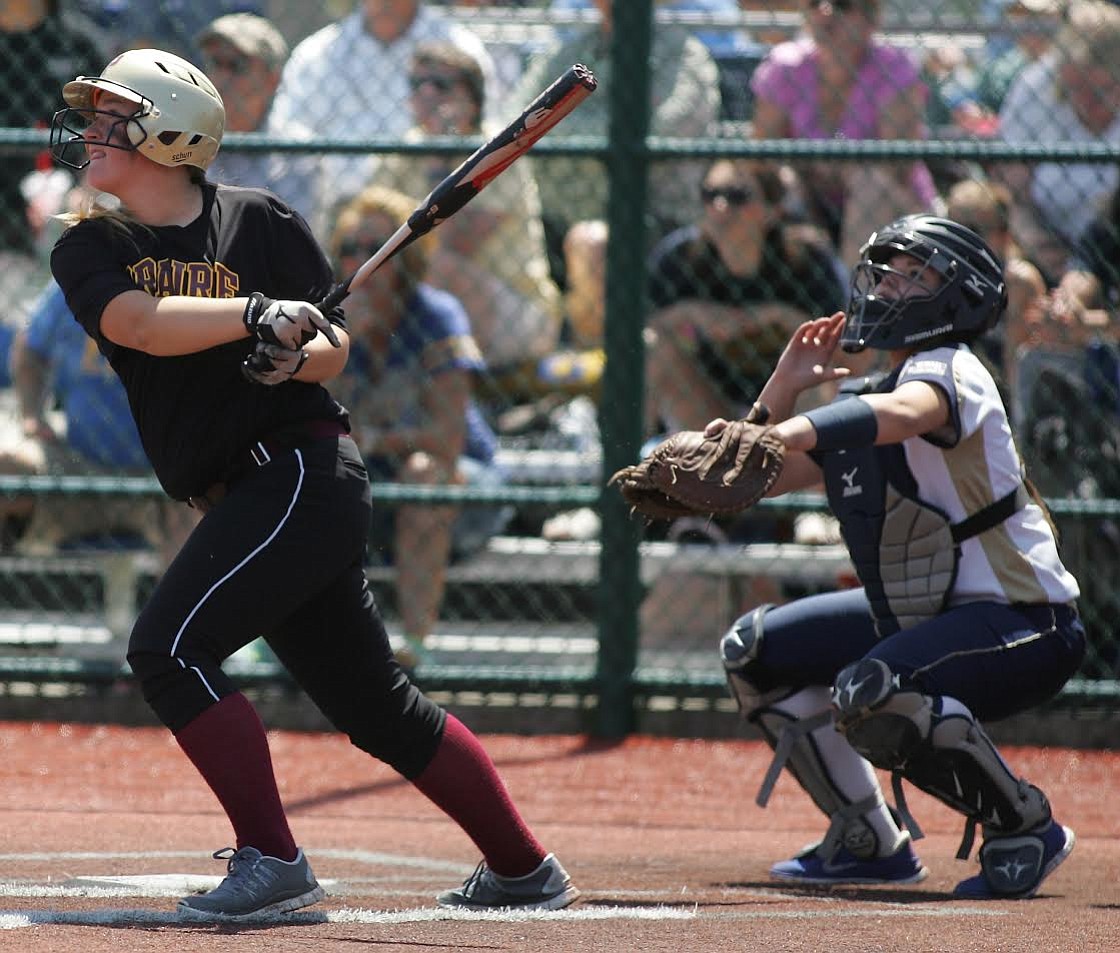 Taylor Ramey watches her game-winning, two-run home run sail over the fence as the Prairie softball team beat Kelso 8-7 in the 3A state tournament in Lacey (Jim Bryant/For The Columbian)