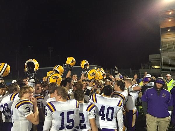 Columbia River players celebrate after a 49-35 win over Kelso on Friday to clinch the 3A Greater St.