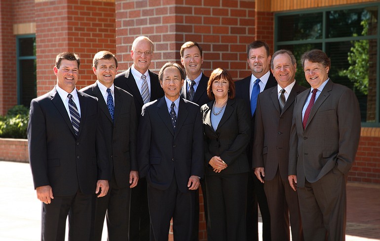 RS Medical CEO John Konsin, fifth from left, hired as his executive team, from left, Bob Harmon, Sam Reinkensmeyer, Doug Brunner, Dominic Tong, Patricia White, Rick Harper, Tom Pierce and Patrick Cougill.