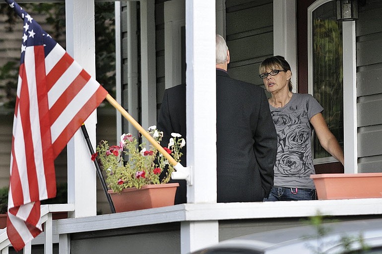 Nancy Neuwelt, the mother of Bethany Storro, talks to Vancouver Police Detective Wally Stefan at the Neuwelt home Monday evening in Vancouver, Washington.