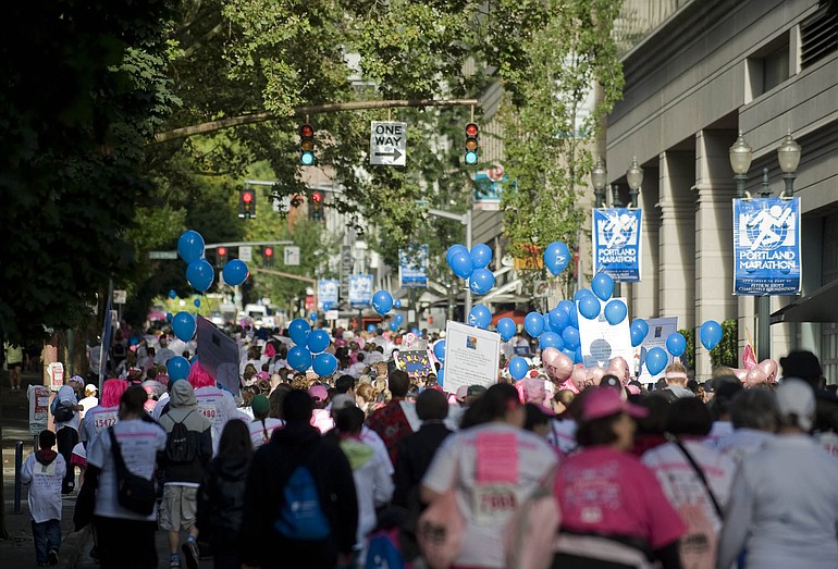 Thousands of participants make their way through downtown Portland during the Race for the Cure event on Sunday September 19, 2010.