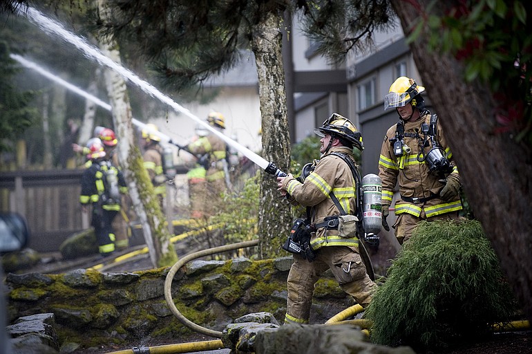 More than 50 firefighters spent Thursday battling a stubborn three-alarm blaze that ripped through a building at the Rolling Creek Apartments in Hazel Dell, displacing 56 residents from 24 apartment units in what was one of the largest local fires in recent memory.