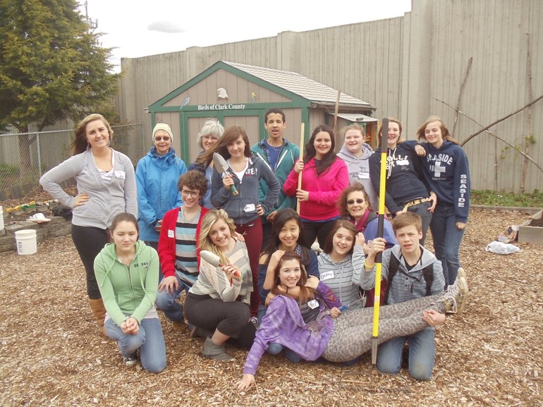 Day of Caring: Vancouver School of Arts and Academics students assist WSU Master Gardeners and Growing Groceries Mentors, Bobbi Bellomy, Marcia Grubb, and Barbara Nordstrom at the Hazel Dell School and Community Garden.