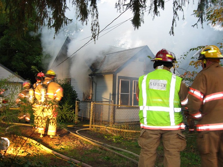 Vancouver firefighters extinguished a house fire on Watson Avenue Thursday morning, but not before it was heavily damaged.