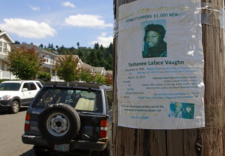 A flier of Yashanee Vaughn is seen posted in northeast Portland on Friday.