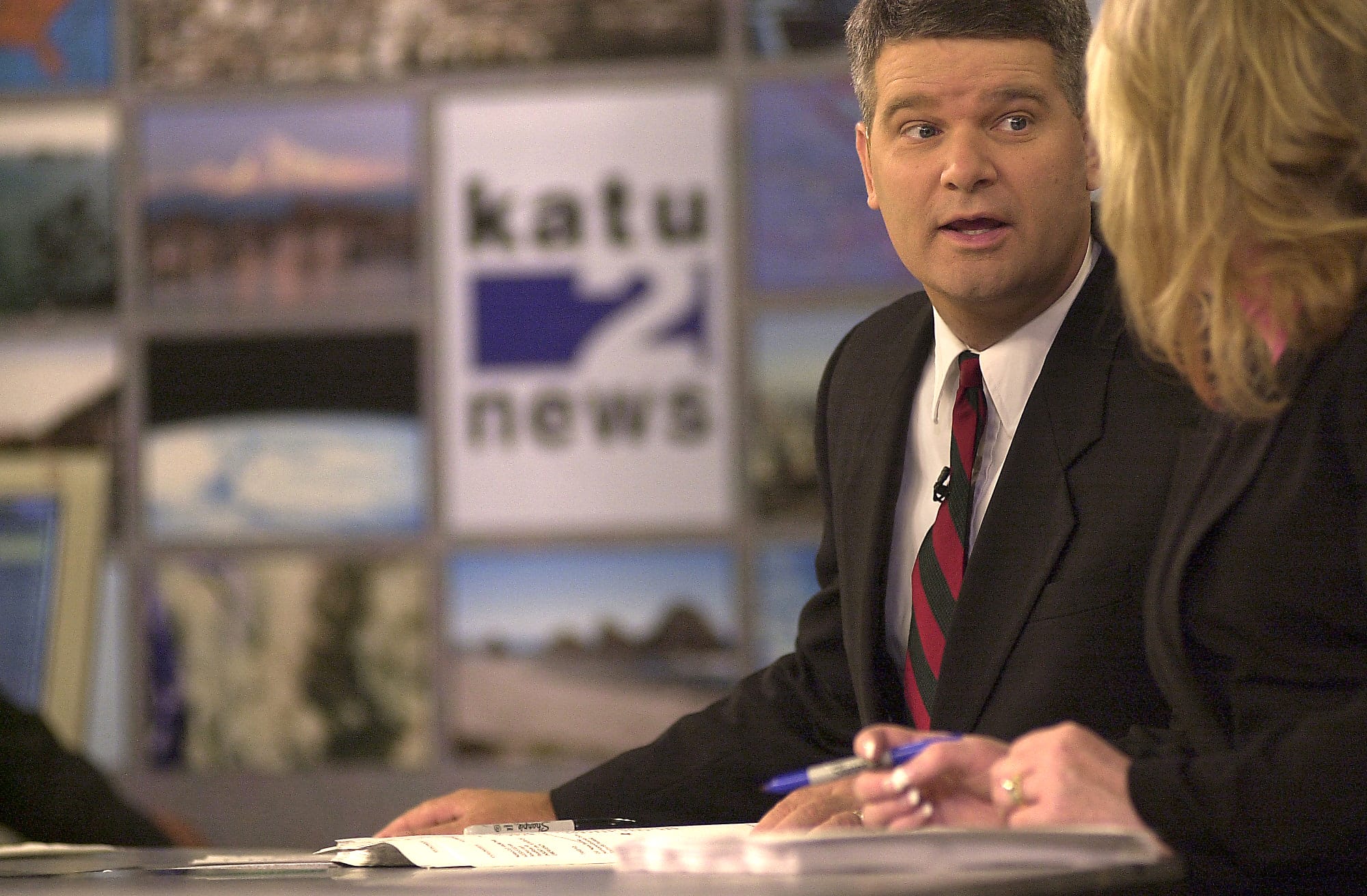 Carl Click reports the early-morning news with co-anchor Helen Raptis on first day on the job at KATU.