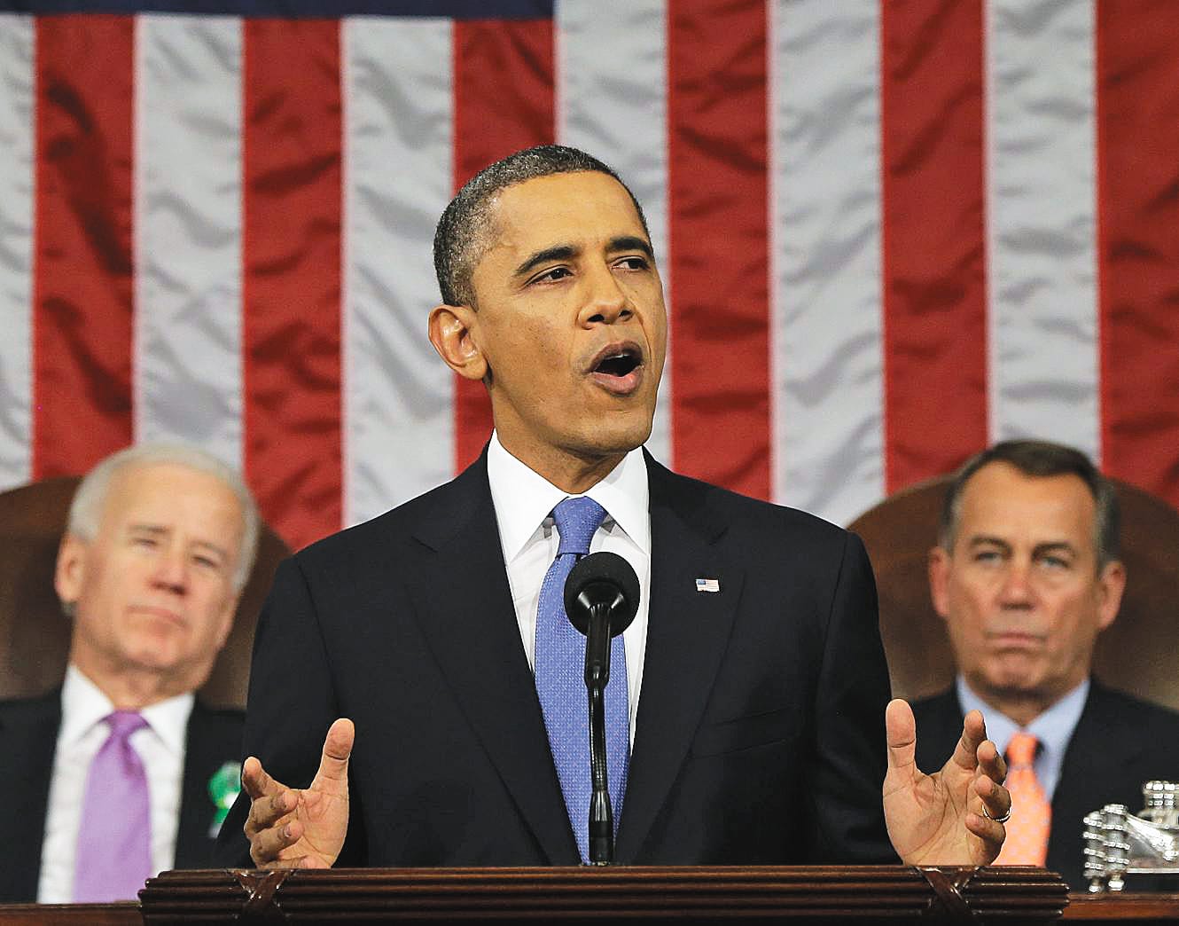 President Barack Obama, flanked by Vice President Joe Biden and House Speaker John Boehner of Ohio, gives his State of the Union address Feb.