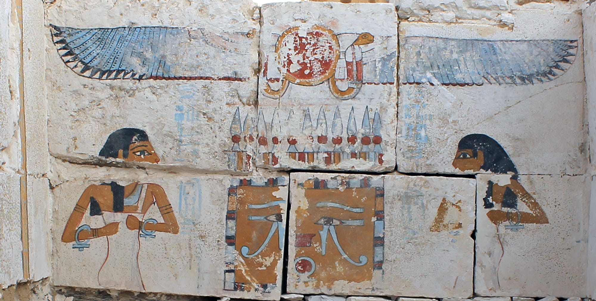 In a painted scene, the goddesses Neith and Nut protect the shrine of the pharaoh Woseribre-Senebkay.