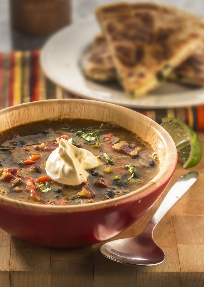 Mexican flavors spark soup-and-sandwich duo, with an earthy bean soup and, standing in for the sandwich, a spicy cheese and roasted poblano quesadilla.