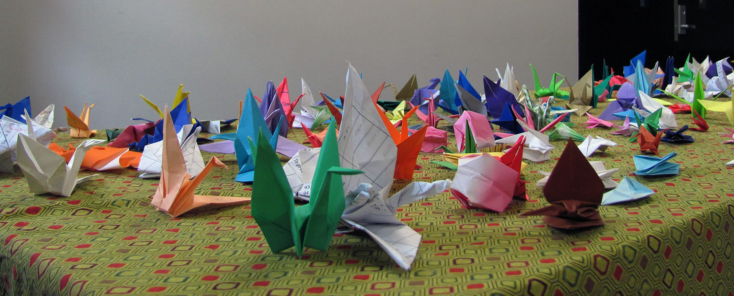 Colorful origami decorates a table at the festival.
