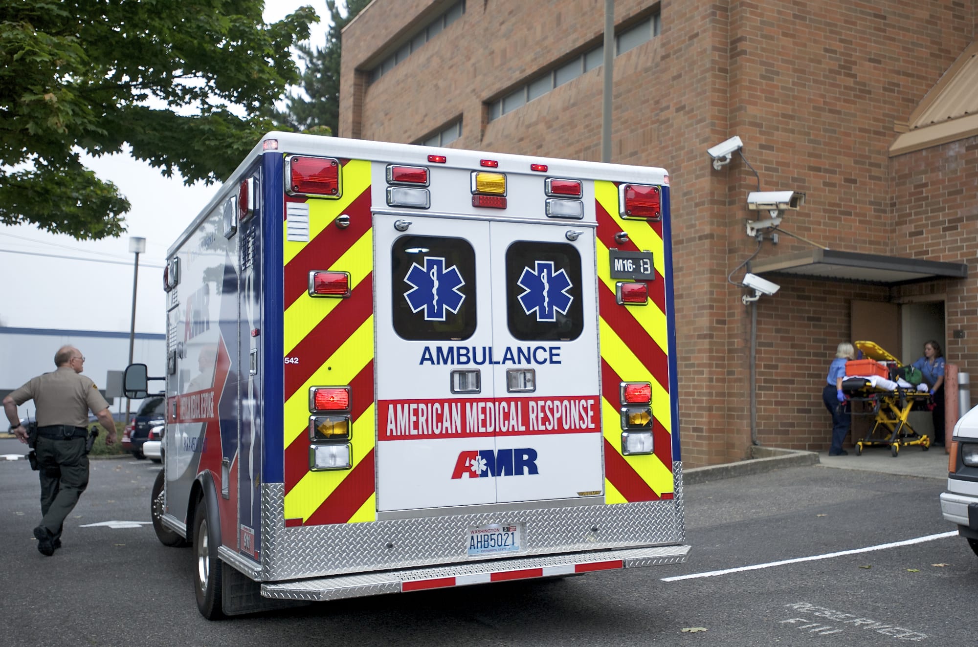 An AMR ambulance crew arrives to a call at the Clark County Jail in October.