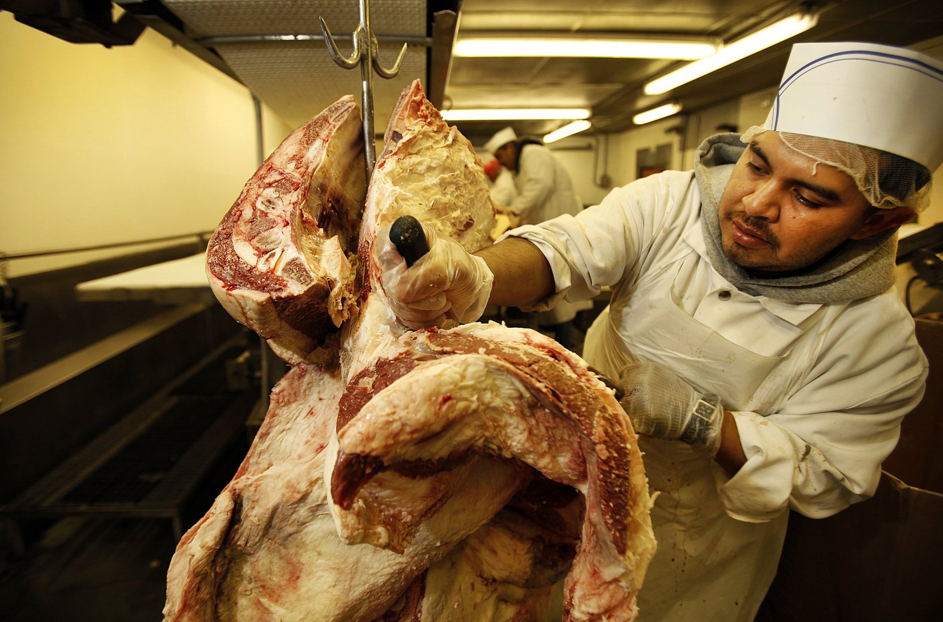 Juan Hernandez is cutting beef brisket at R.C. Provisions in Burbank, Calif., on March 28 as beef prices are at record highs because of thinning cattle herds decimated by drought.