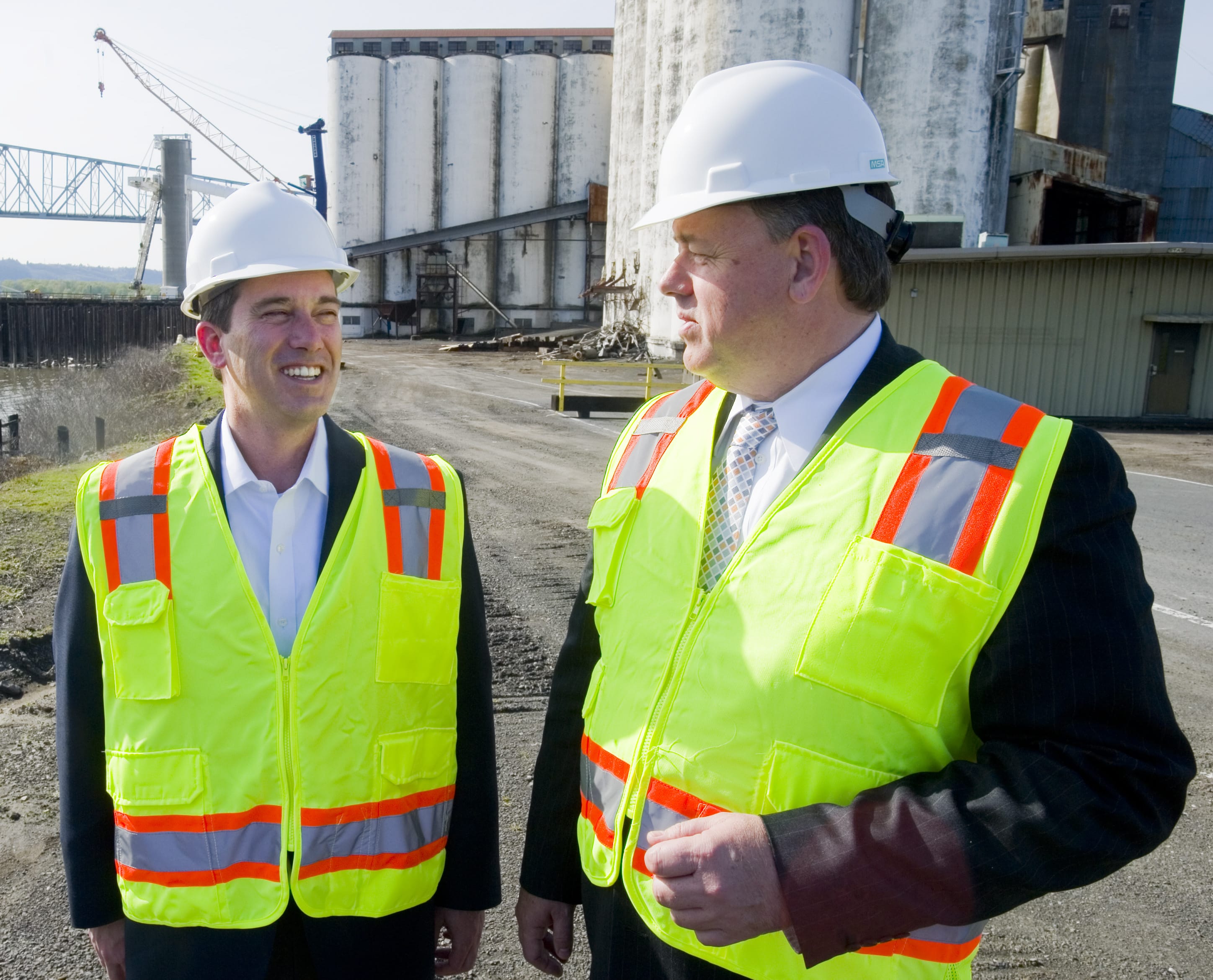 Haven Energy President Greg Bowles, left, and Port of Longview Director Gier Kalhagen walk near Berth 4, the proposed site of a propane and butane export terminal Bowles' company hopes to build and operate.