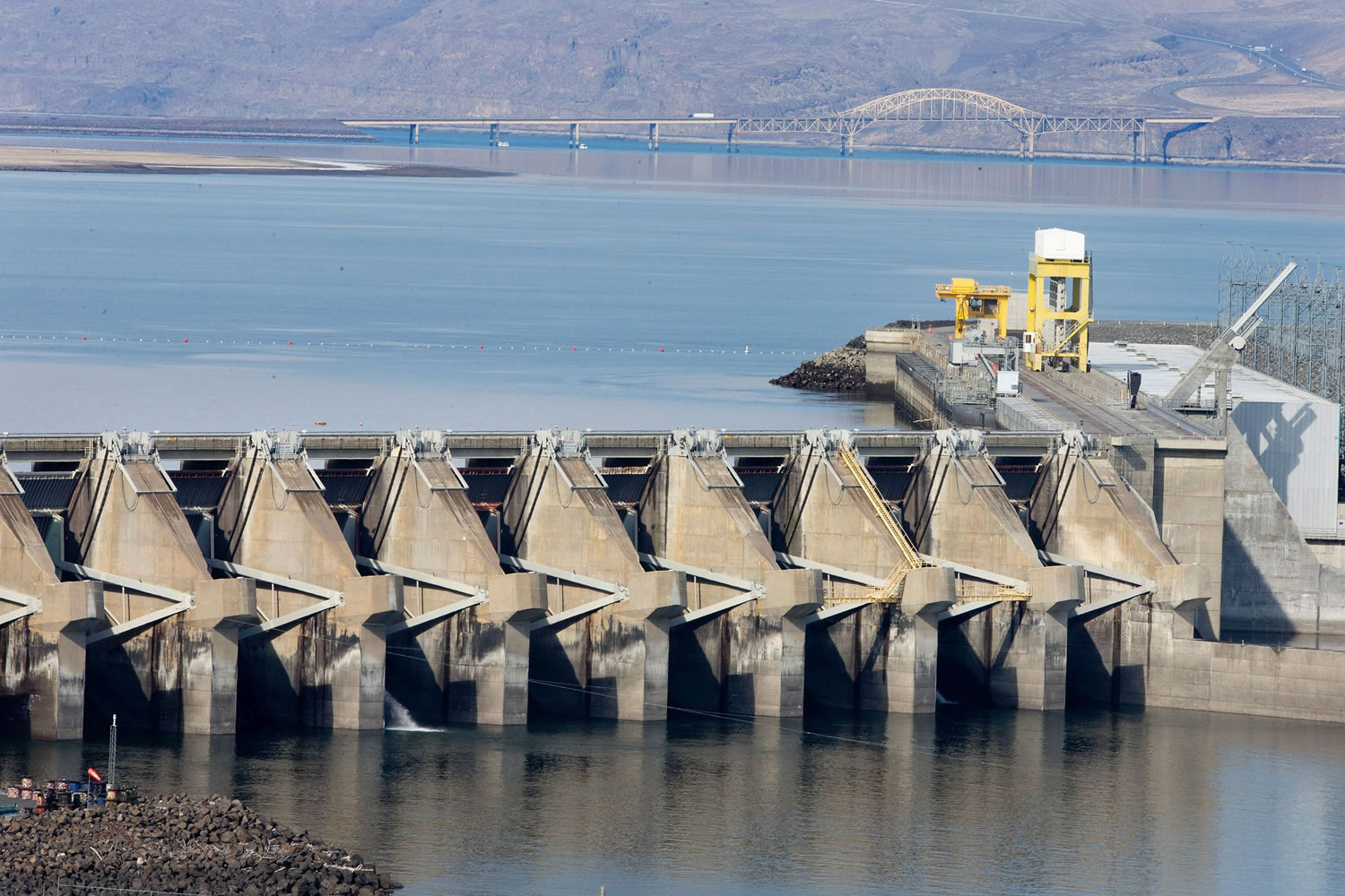 The fourth support from the right at the Wanapum Dam spillway near Vantage has a large crack beneath the water surface that was discovered last month.