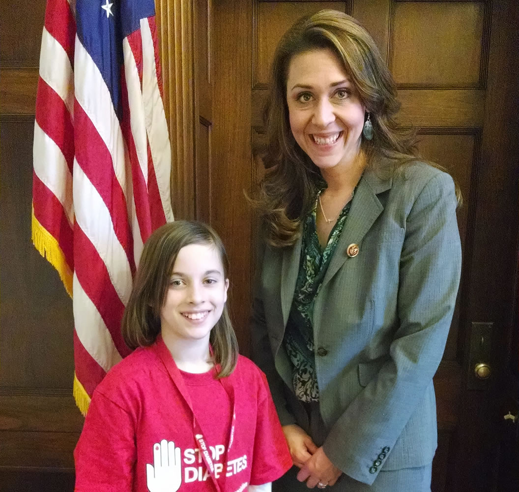Hathaway Elementary School fourth-grader Paige Maas stands with U.S. Rep. Jaime Herrera Beutler of Camas during a trip to Washington, D.C.
