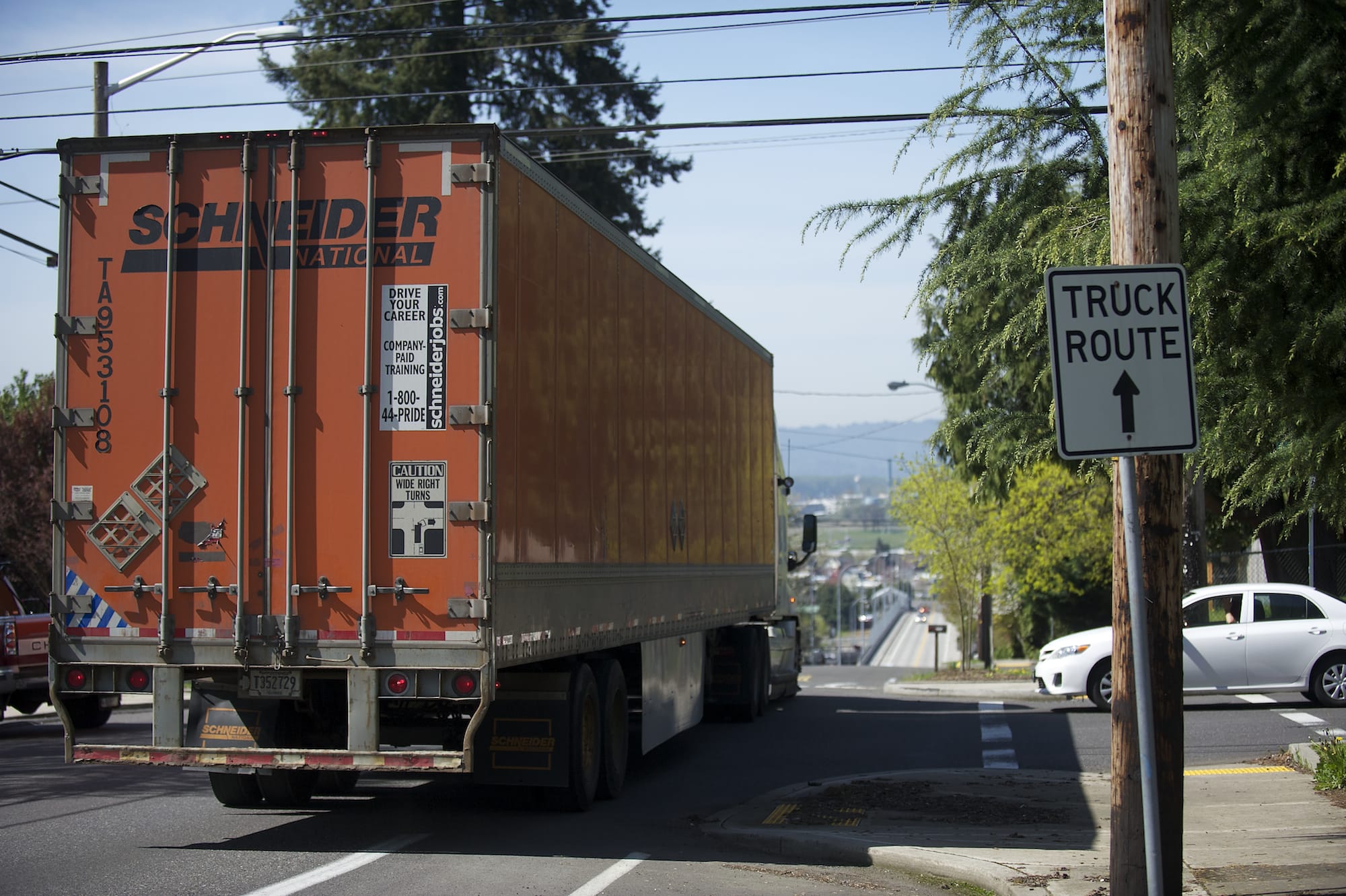 A truck travels westbound on West 39th Street, one of four east-west arterials from Interstate 5 to industrial areas.