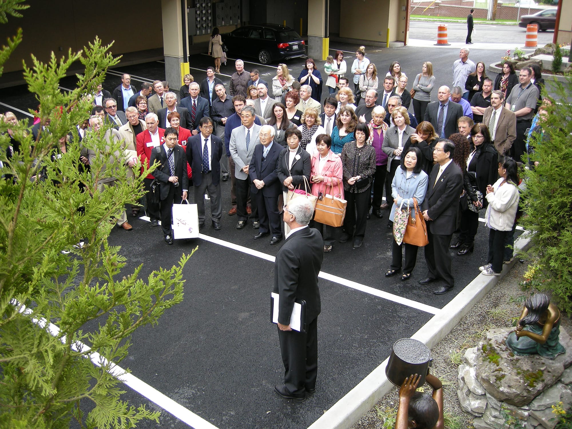 Elie, Kassab, president and owner of Prestige Development, addresses a crowd gathered Wednesday morning to celebrate the grand opening of Prestige Plaza, a $16 million apartment complex in downtown Vancouver.