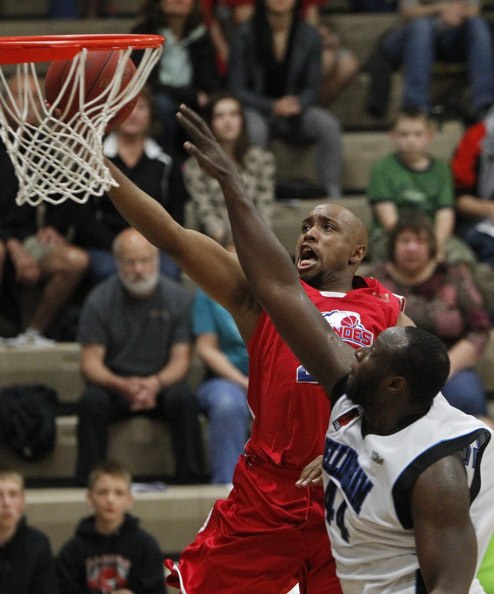 Vancouver Volcanoes guard Andre Murray, left, shoots against Bellingham in a game earlier this season.