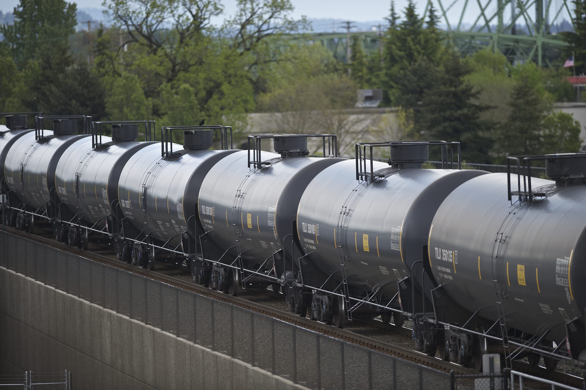 An oil train passes through downtown Vancouver on Friday.