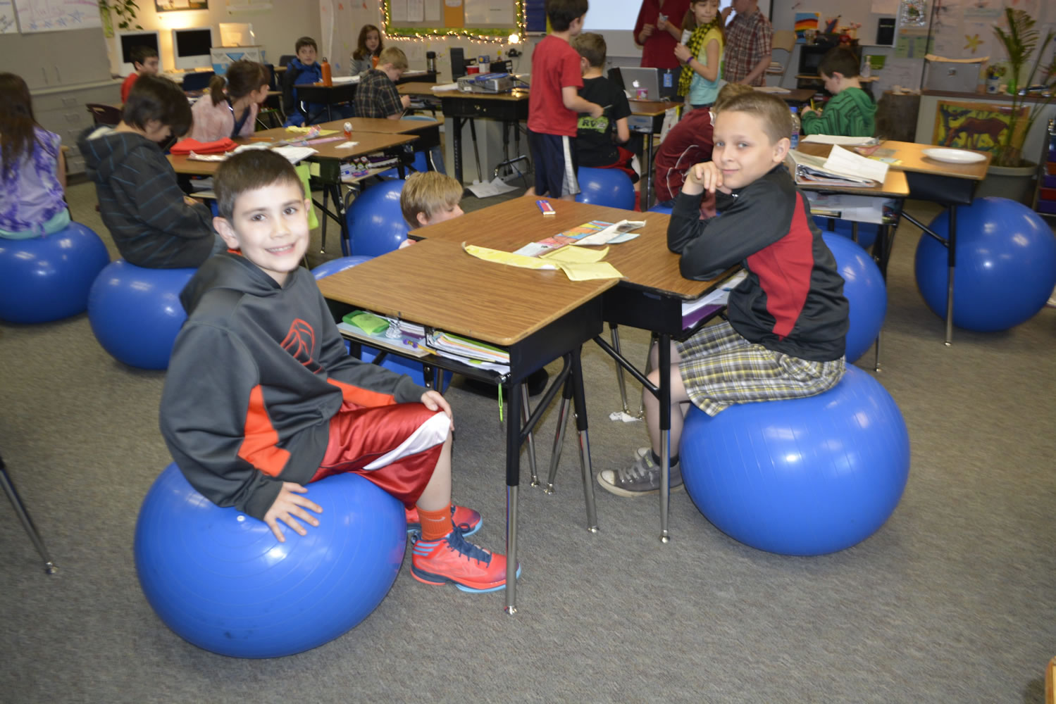 Aiden Baalaer (left) and Christian Smith enjoy using the new stability balls in their fourth-grade classroom at Cape Horn-Skye Elementary School in Washougal.