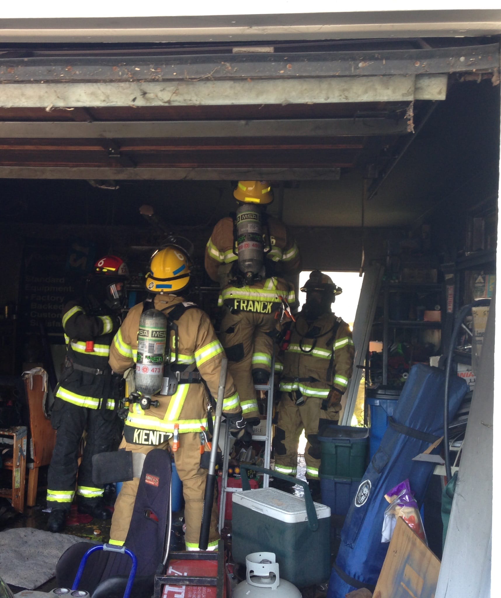 A fire sparked by smoldering smoking material damaged a Salmon Creek garage.