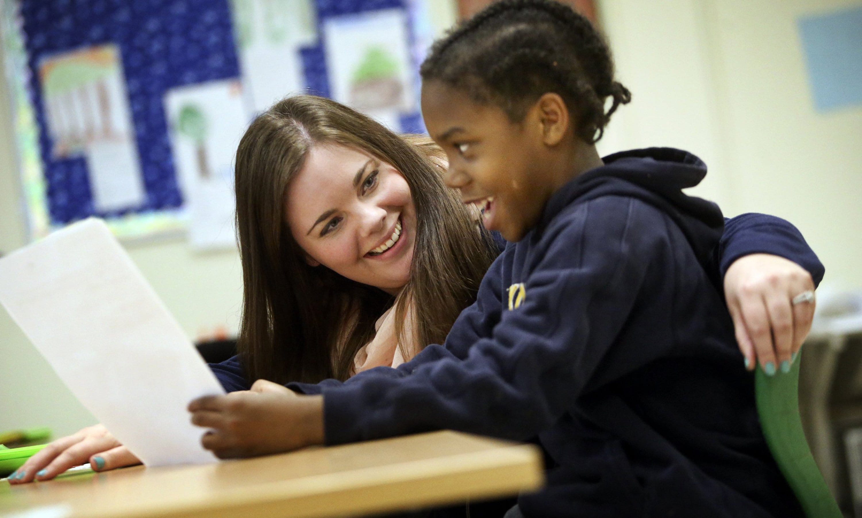 David Joles/Minneapolis Star Tribune
Samantha Ovadal, an education assistant with a bachelor's degree, listens to a student April 22 at John Glenn Alternative Learning Program in Maplewood, Minn.