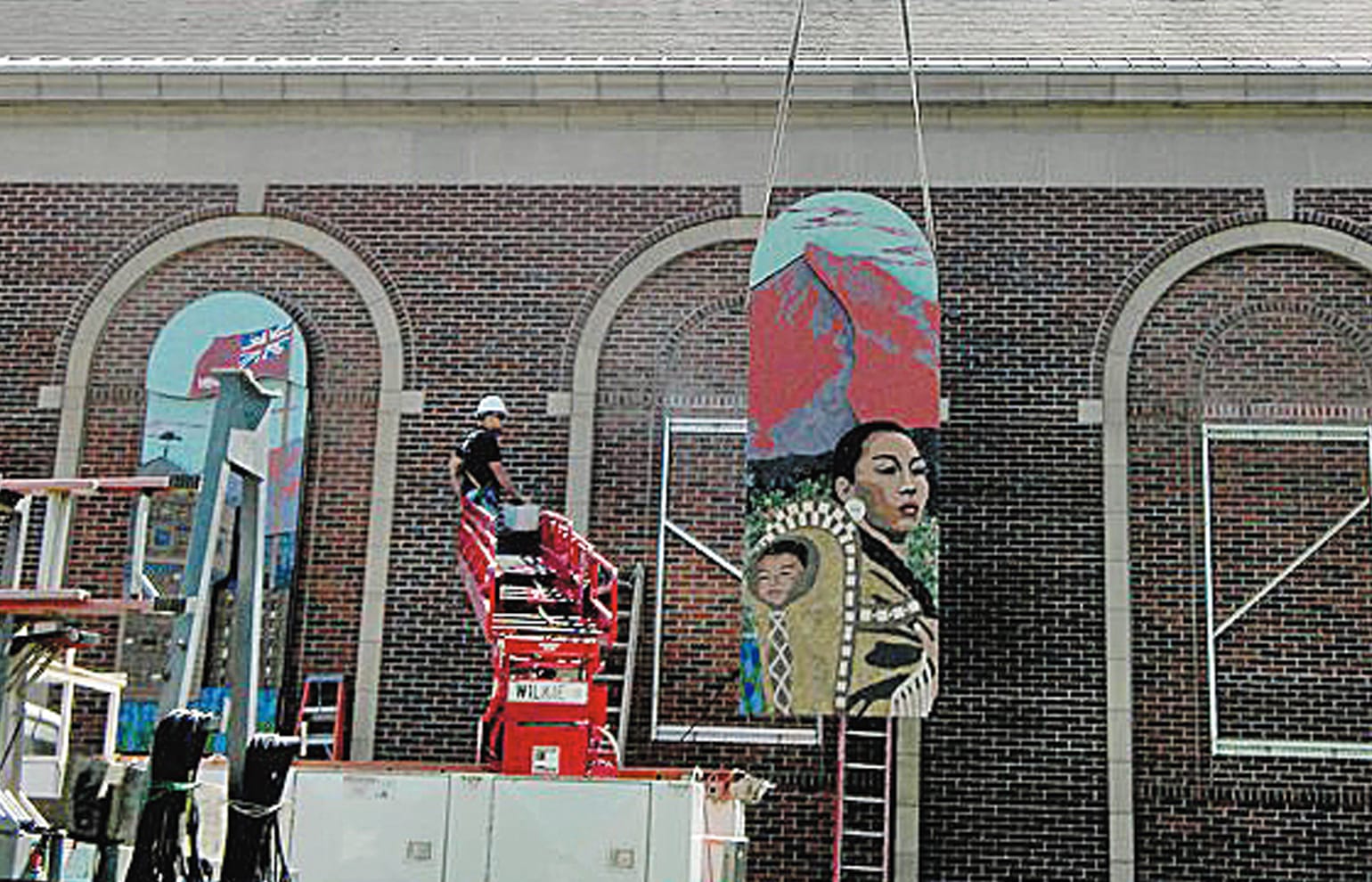 The final Vancouver School of Arts and Academics Confluence Project triptych of mosaic artwork was installed Tuesday morning on the exterior of the school.