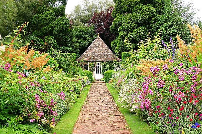 The flowering perennial border at England's Rodmarton Manor offers a glimpse of garden perfection.