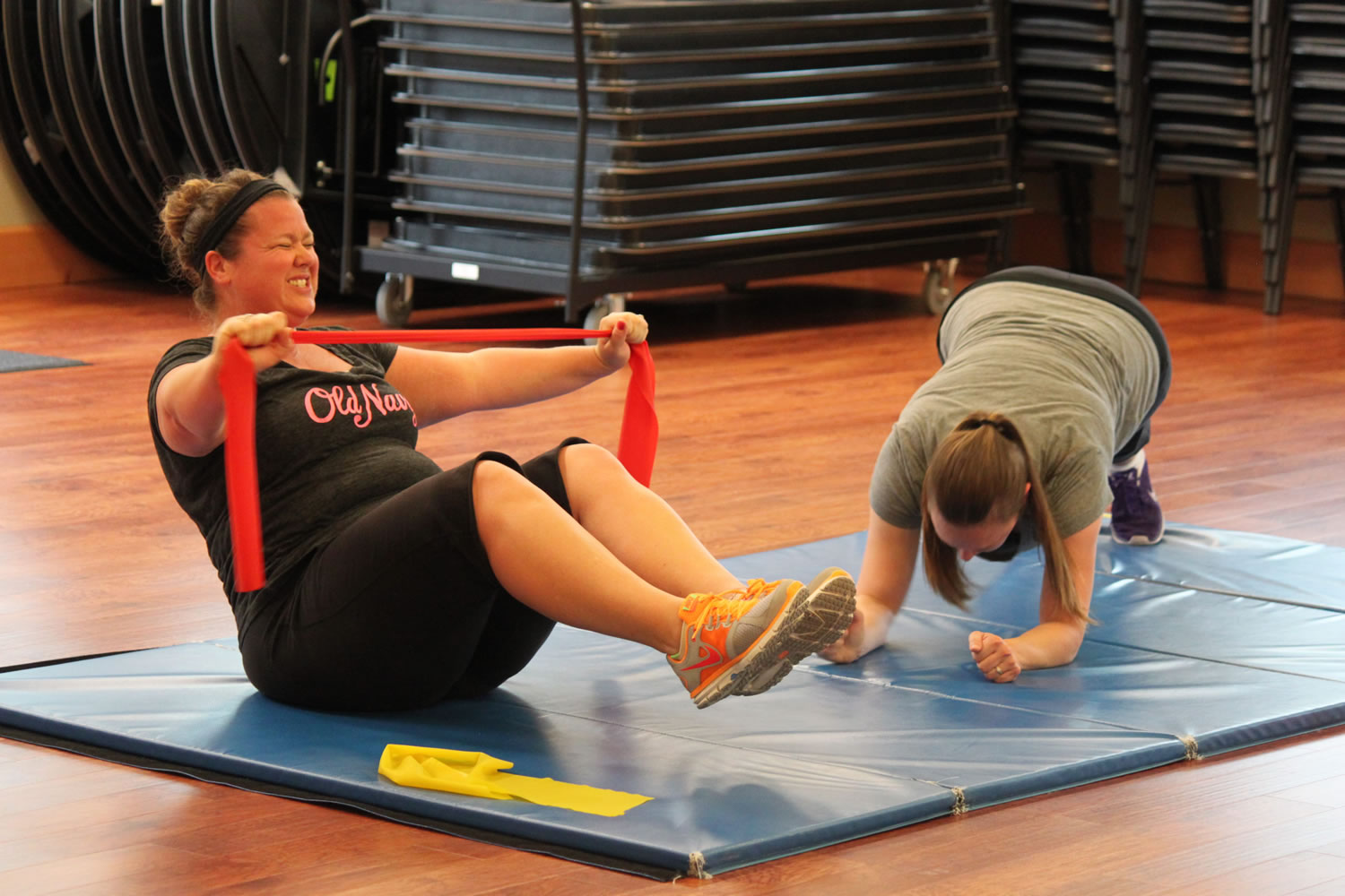 Stephens' metabolic conditioning class often includes a circuit training workout, which incorporates the use of resistance bands, punching bag, balance balls, free weights and good old fashioned body weight resistance. Krissy Barlow (left) said her participation in the class has helped to improve her physical health and appearance.