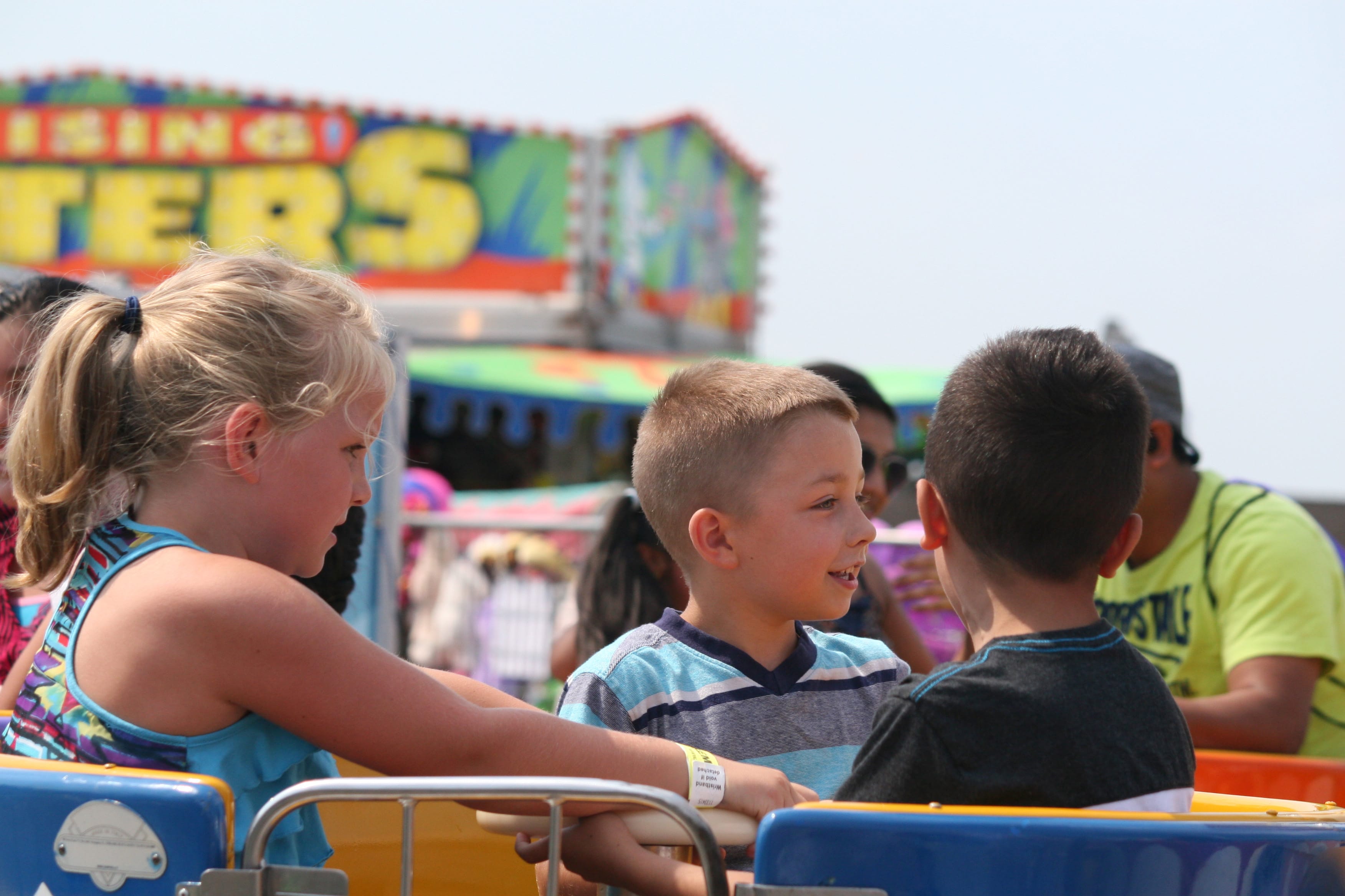 Young attendees enjoy one of the many rides during opening day Friday at the Clark County Fair . It will continue through Aug.