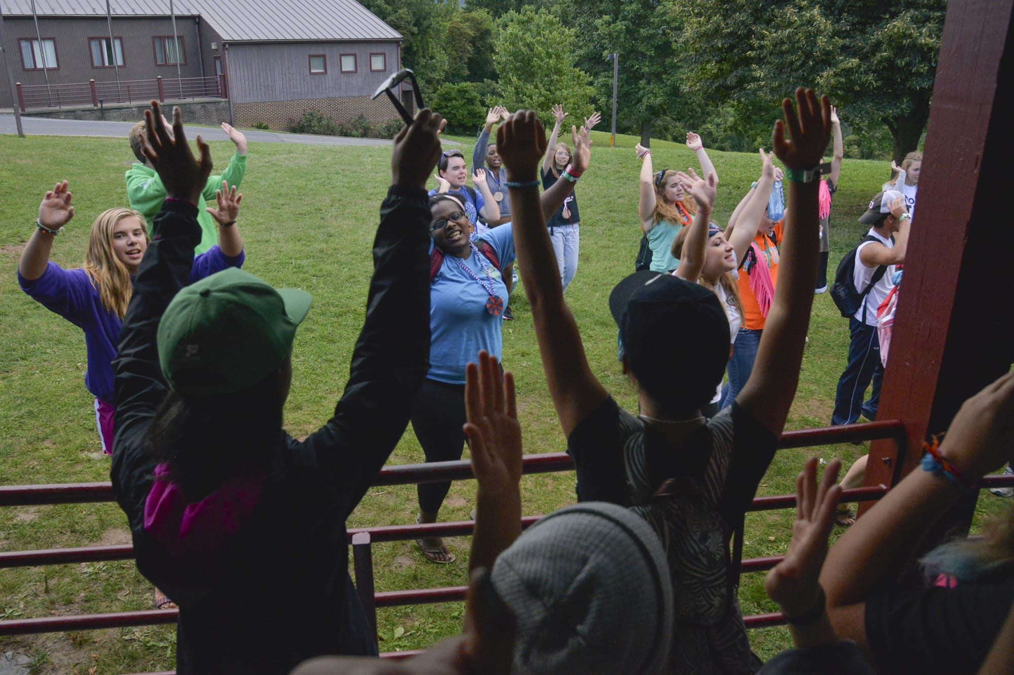 Counselors and staff members lead campers in a cheer at Camp Corral in Front Royal, Va. The free summer camp for children of military parents wounded, disabled or killed in combat holds 22 sessions in 16 states. Illustrates CAMPS-MILITARY (category a), by Karen Chen (C) 2014, The Washington Post. Moved Thursday, Aug. 14, 2014.