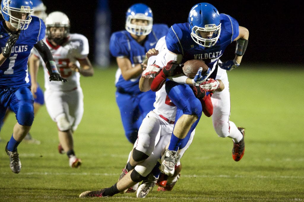 La Center's Cole Judd carries the ball against Columbia High School, Friday, October 10, 2014.(Steven Lane/The Columbian)