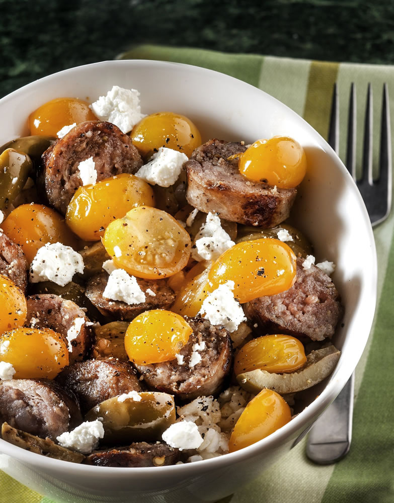 Sauteed Sun Gold Tomatoes With Sausage And Goat Cheese make a delicious summer meal.