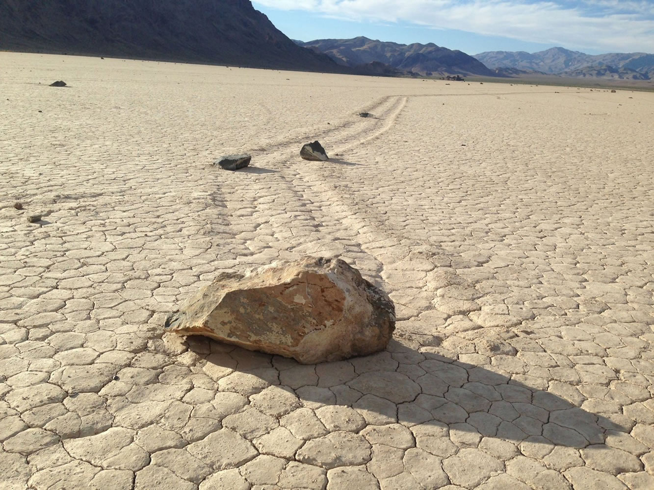 A few of the hundreds of rocks that have left trails as they moved across the surface of Racetrack Playa in California's Death Valley National Park on August 18, 2014. There were several theories for the strange activity, but Richard Norris, a paleobiologist at Scripps Institution of Oceanography, and his cousin James Norris, a research engineer, were the first to photograph rocks in motion.