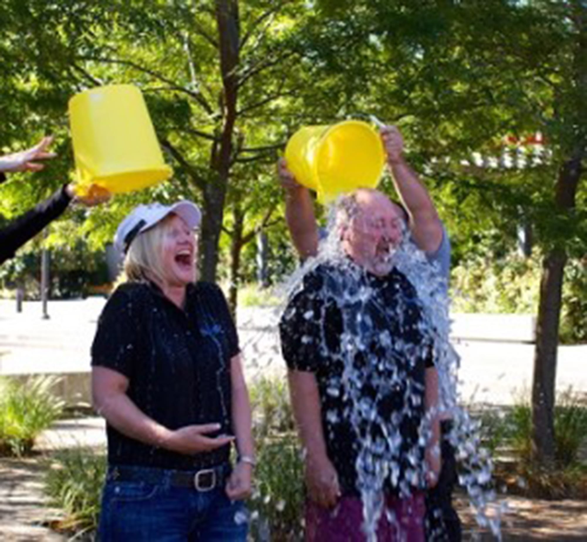 Clark County: Monique and Wes Rice, who run Effective Web Solutions in Washougal, take the Ice Bucket Challenge for the ALS Association during their company's five-year anniversary party on Aug.