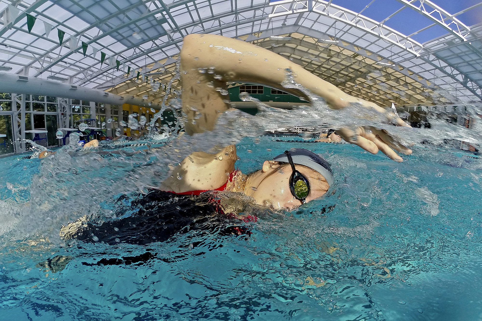 Union sophomore Sophie Carlson swims during practice at the YMCA on Thursday September 4, 2014.