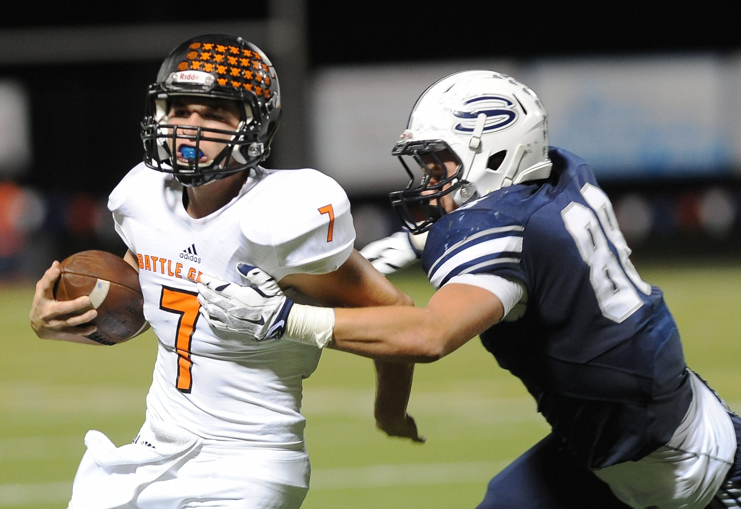 Gunner Talkington of Battle Ground is pursued by  Skyview's Skyler Martin at a game at the Kiggens Bowl in Vancouver, Friday September 17, 2015.