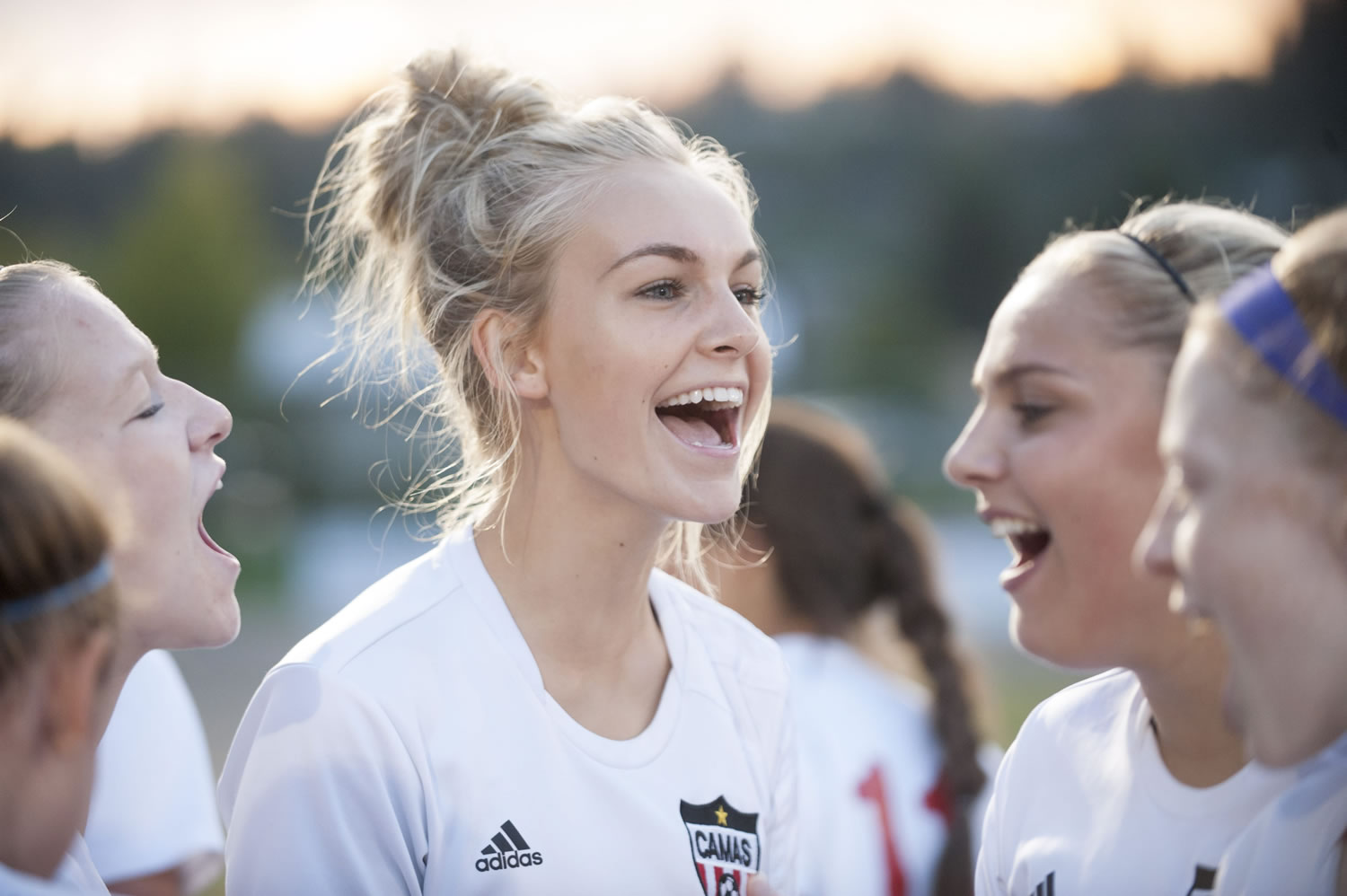 Camas senior Mason Minder takes her role as team captain seriously as she gets the team pumped up for a recent match against Evergreen.