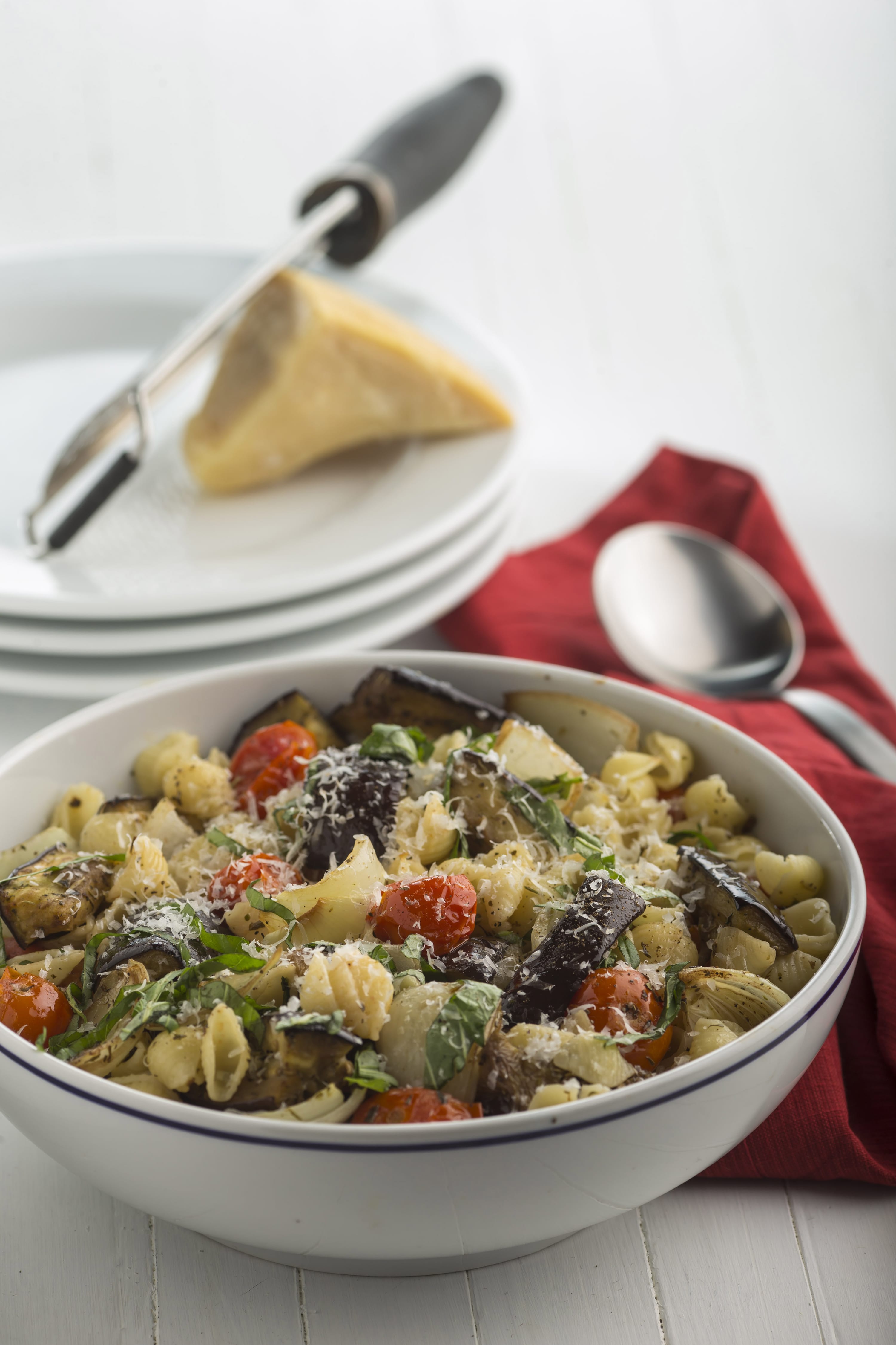 Pasta with roasted eggplant, onions and tomatoes.