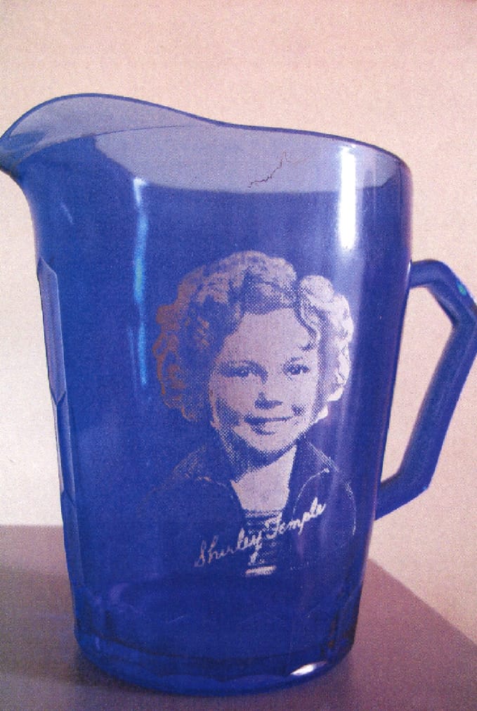 A Shirley Temple milk pitcher, made in the 1930s.
