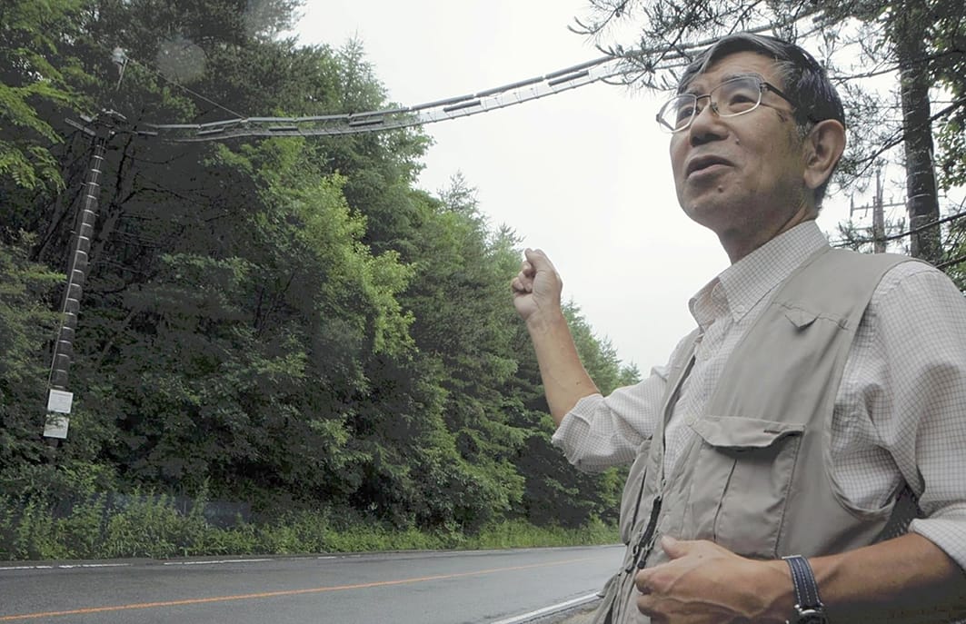 Koichi Otake explains about the suspension bridges that small animals use to cross roads, in Hokuto, Yamanashi Prefecture. Illustrates JAPAN-CONSERVATION, (category i), by Yukiko Yamamoto (c) 2015 The Japan News/Yomiuri, Moved Saturday, Sept. 5, 2015. (MUST CREDIT: The Japan News/Yomiuri photo).