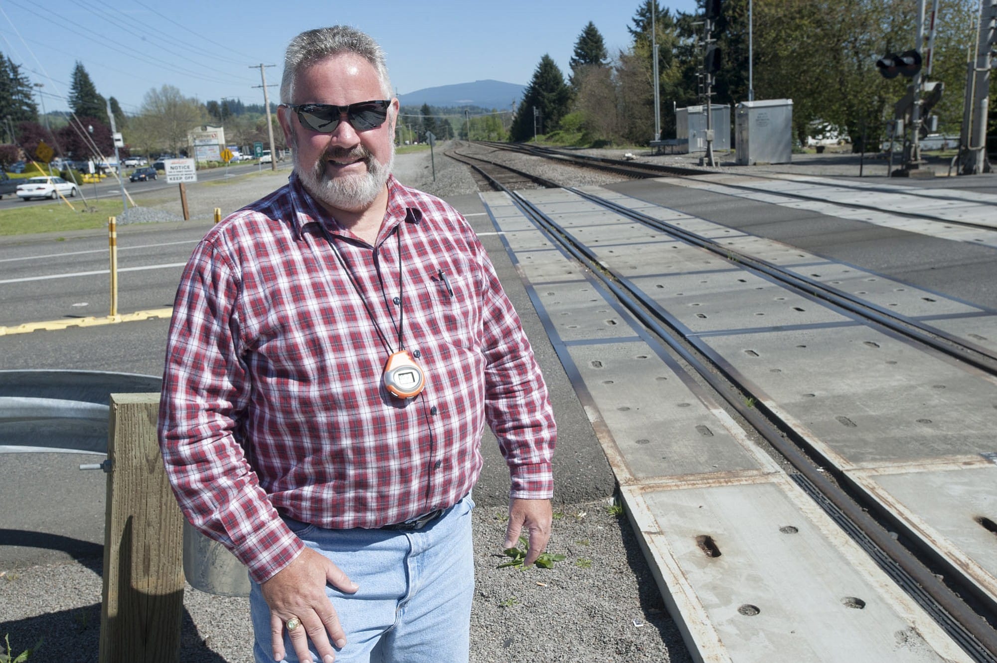 Washougal Mayor Sean Guard pauses at the railroad tracks, near his downtown Washougal campsite.