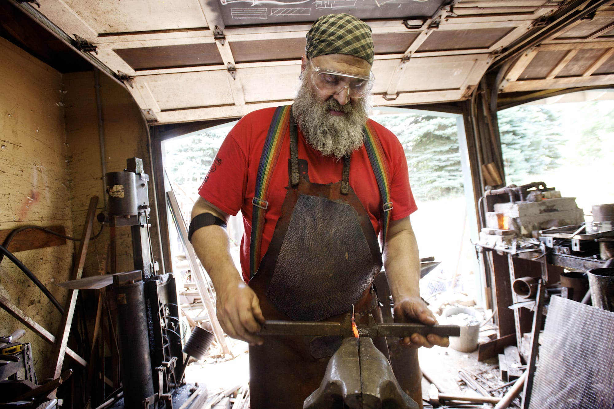 Blacksmith Nicholas Marcelja of Red Troll Forge, works from his shop, Thursday, August 14, 2014.
