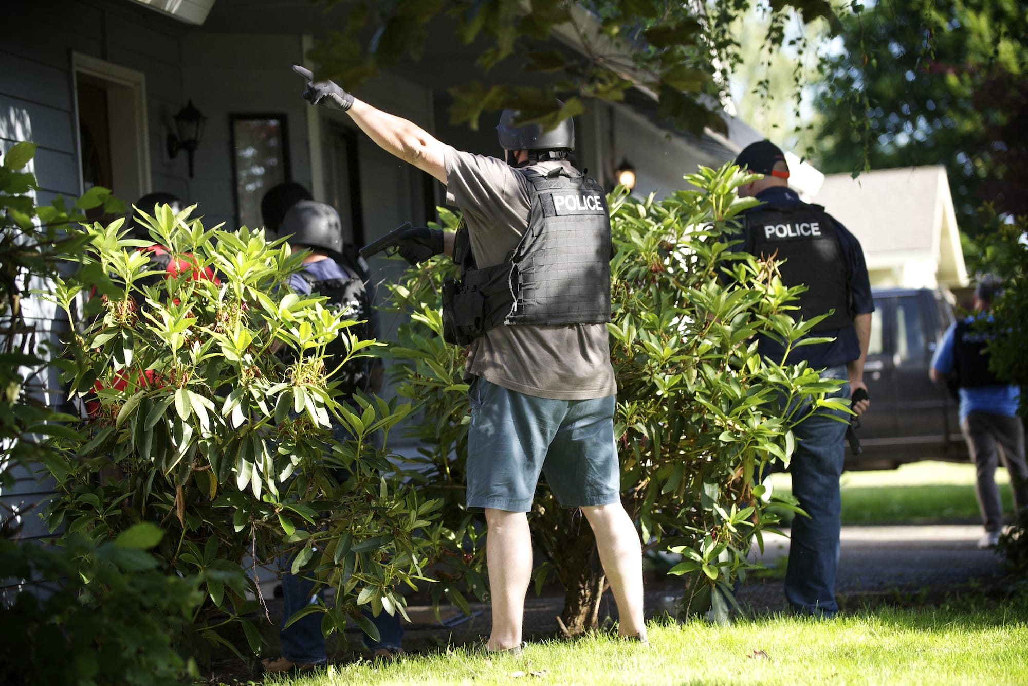 The Clark-Vancouver Regional Drug Task Force executes a search warrant at a suspected drug house Wednesday in Felida.