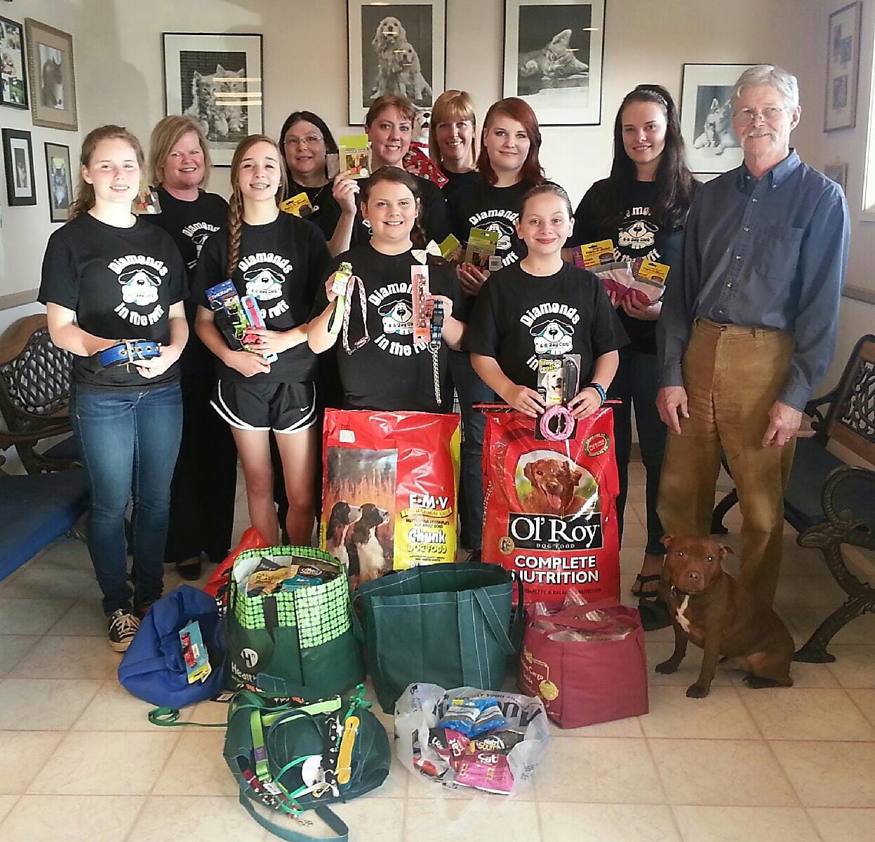 Hazel Dell: The Diamonds in the Ruff 4-H Club recently makes a donation to the Hazel Dell Animal Hospital. Front row, from left: Alyssa Selfridge, Sarah Whetsell, Megan Whetsell, McKenna Miltenberger and veterinarian David Slocum.