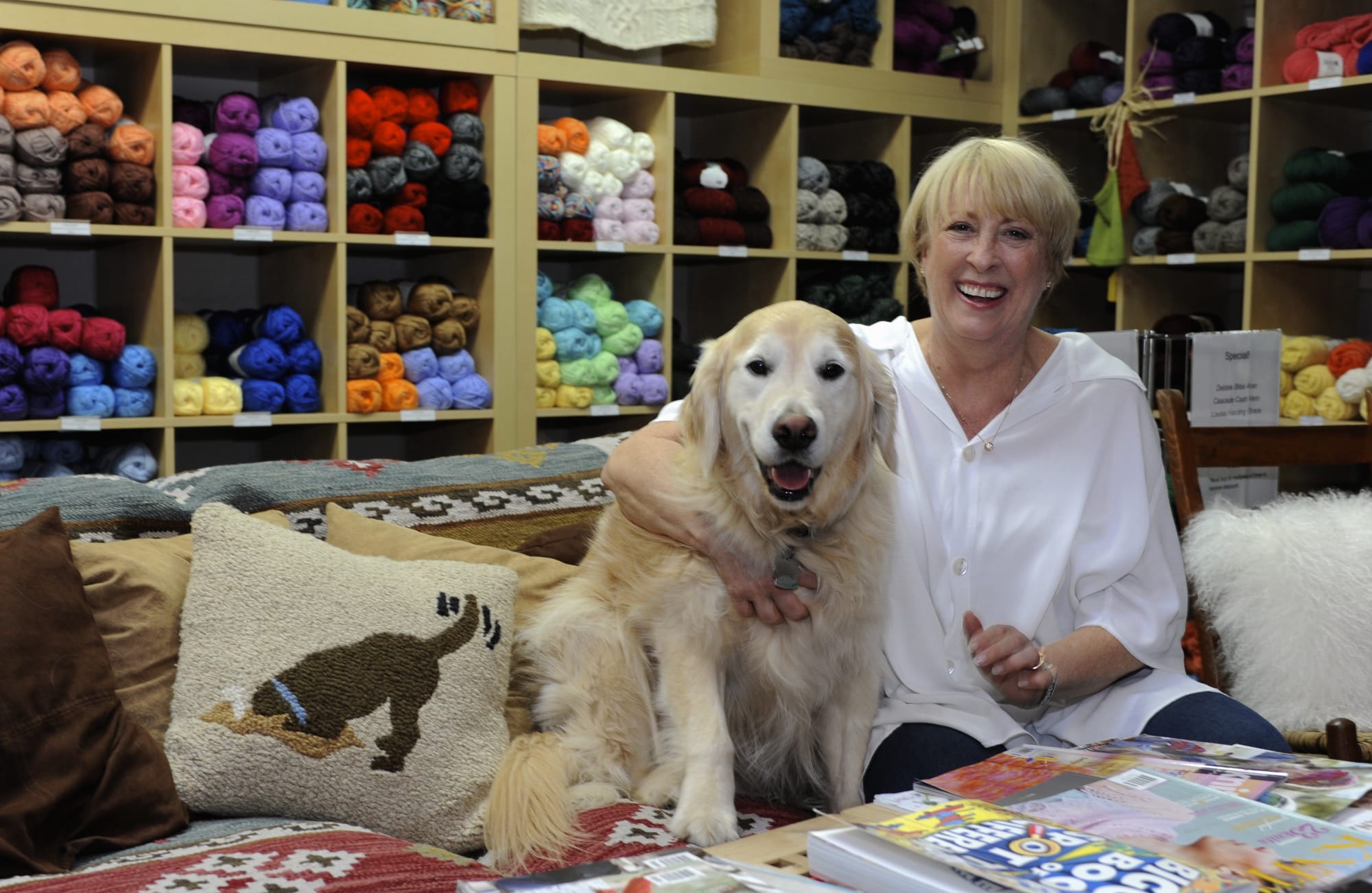 Jennifer Powell, with her dog, Bentley, at her store Wooly Wooly Wag Tails Yarn in Washougal.