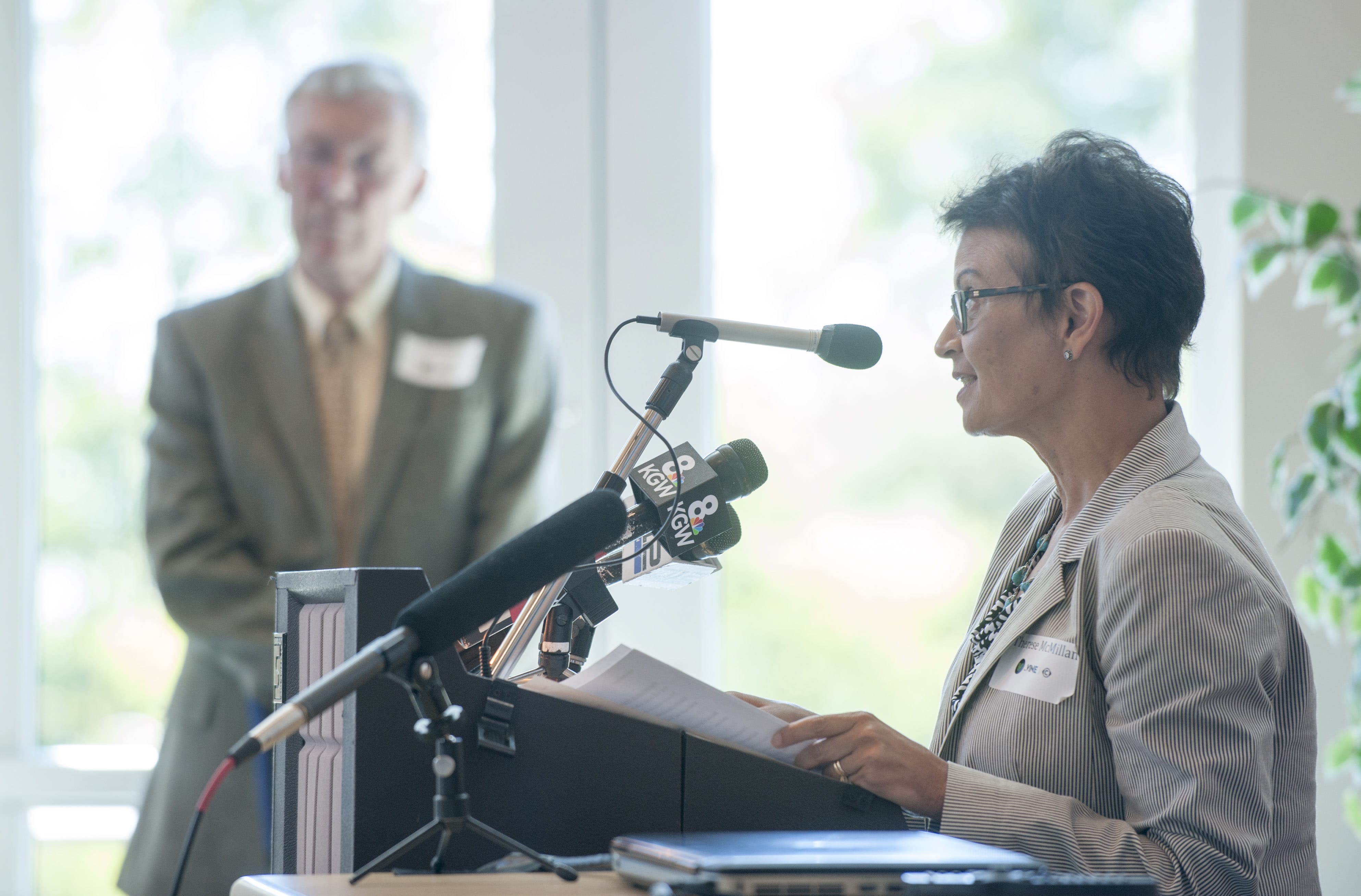 FTA Administrator Therese McMillan speaks as C-Tran CEO Jeff Hamm listens in the background, at an event at Clark College in Vancouver, Thursday September 10, 2015. McMillan officially announced a $38.5 million grant award for C-Tran's bus rapid transit project known as The Vine.